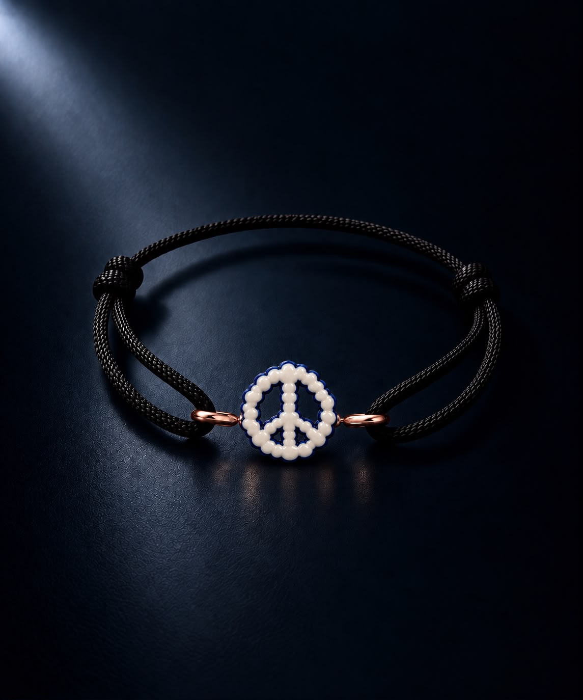 The Peace Treaty — woven cord bracelet with hand-finished charm
