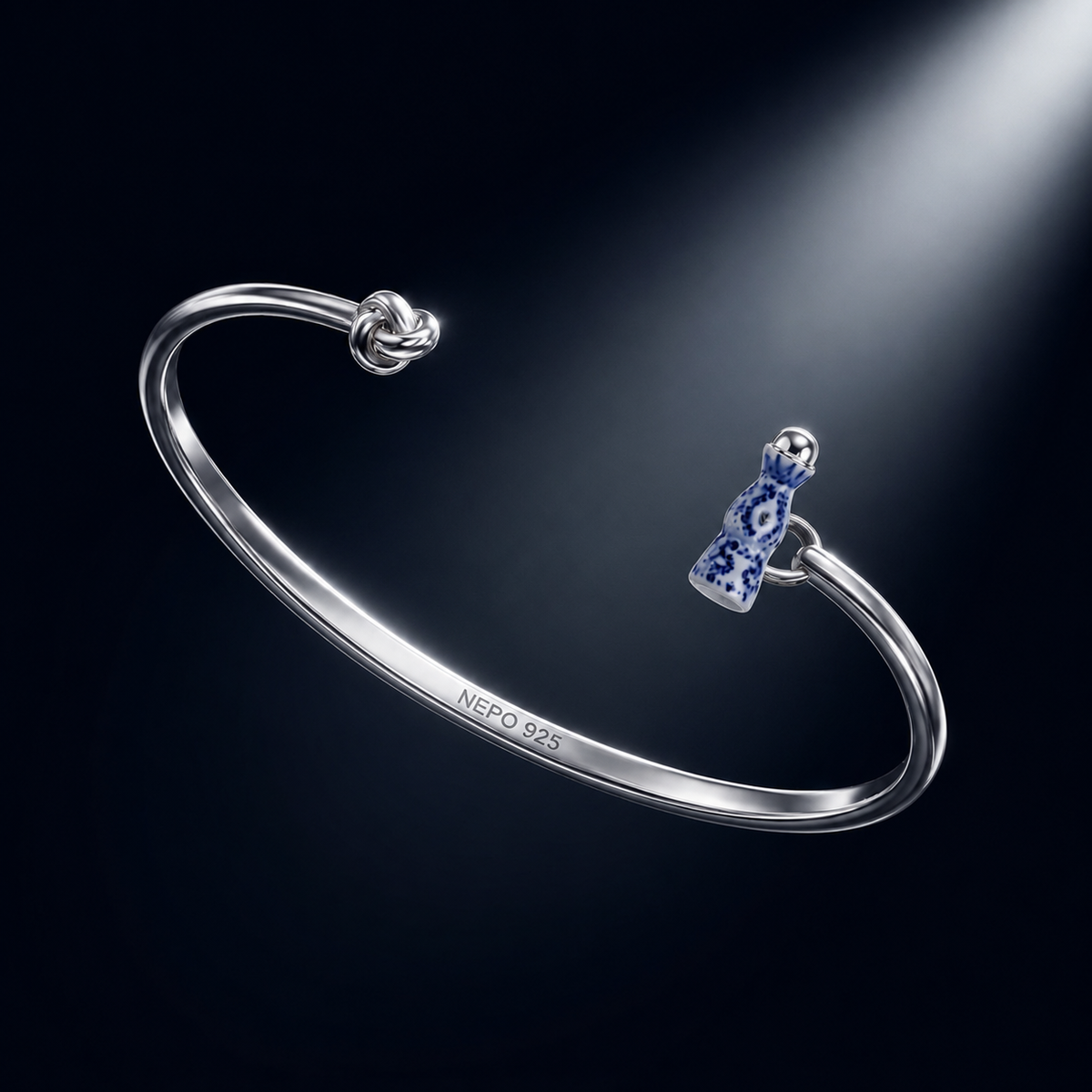 The Hungover — sterling silver knot bangle with hand-painted porcelain tequila bottle charm
