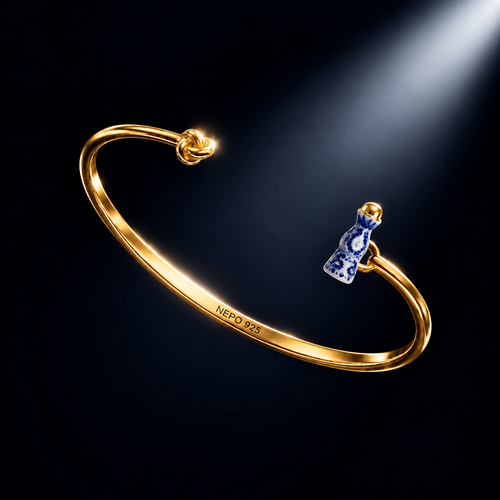 The Hungover — gold-plated knot bangle with hand-painted speedboat charm